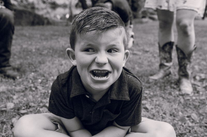 little boy making a fun face